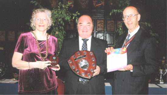 The Mayor presents Mr McGarr with his award